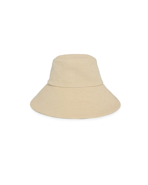 A light beige bucket hat with a wide brim, shown from a front-facing perspective on a solid white background.