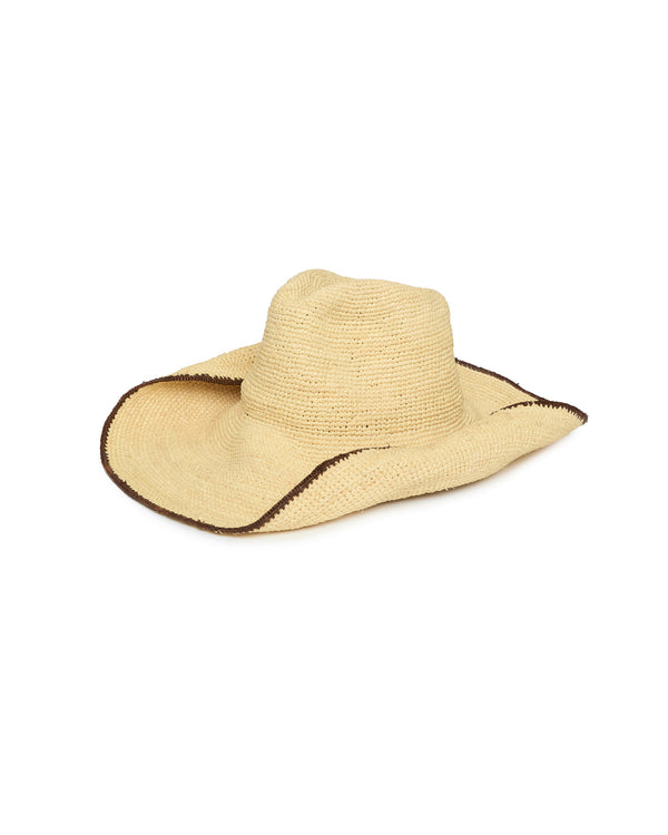 A natural straw cowboy hat with a dark brown trim along the edge of the brim, shown on a plain white background.